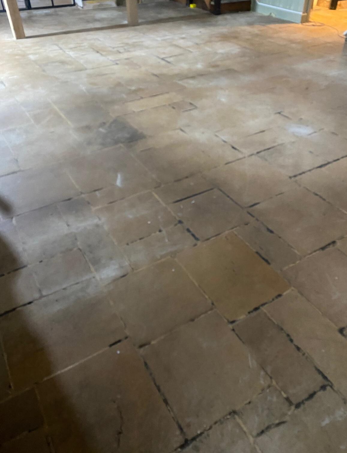 Chequers-Pub-Limestone-Floor-Before-7-e1773211646862.jpeg