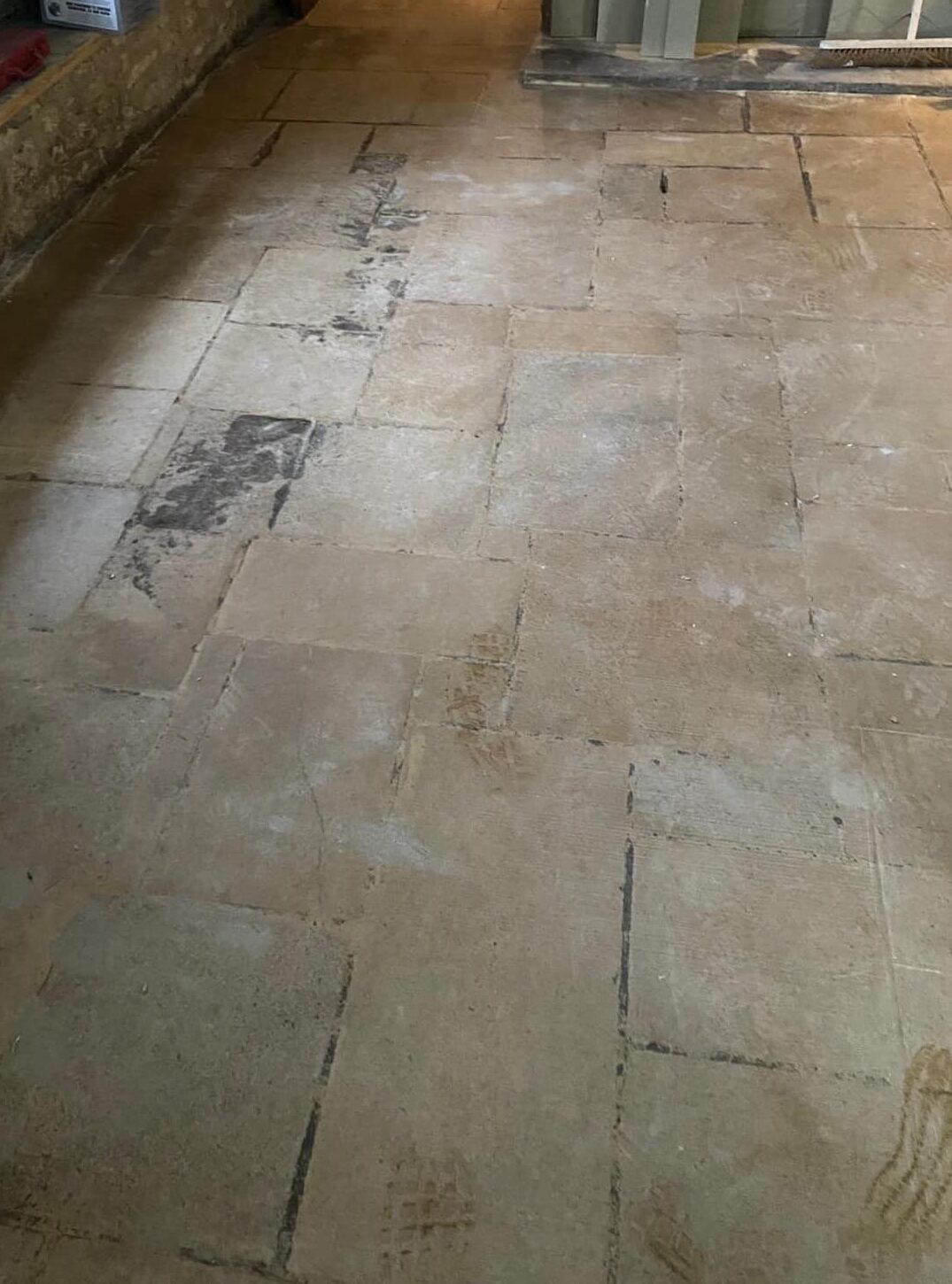 Chequers-Pub-Limestone-Floor-Before-e1773211677107.jpeg